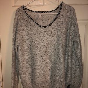 gray fuzzy sweater